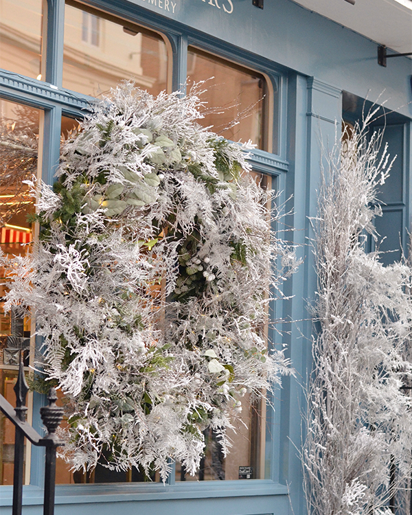 Custom Christmas wreath decoration for luxury shop front in London