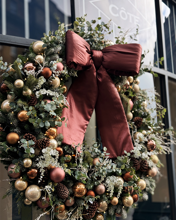 Beautiful custom branded Christmas wreath for Bucks front of store