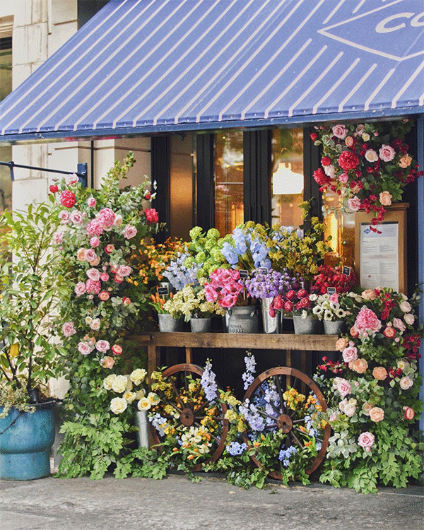 Front of restaurant with decorative flower display