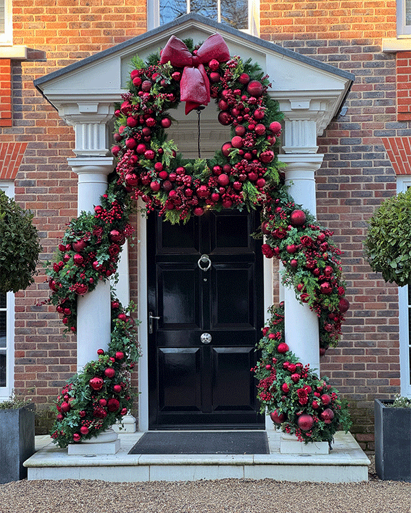 Christmas doorway decorations and wreath at Buckinghamshire home