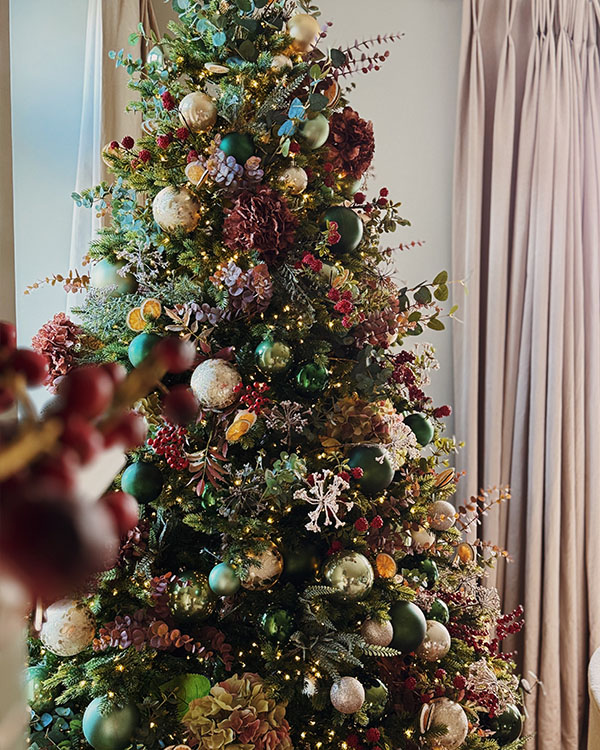 Professionally decorated Christmas tree in home in Berkshire